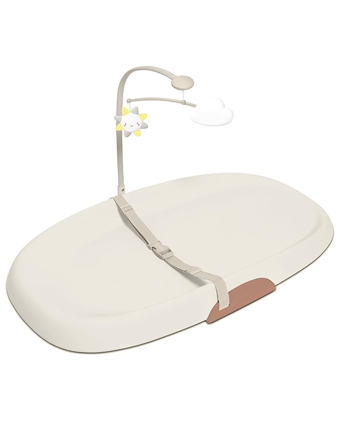 Skip Hop Baby Changing Pad Nursery Style Wipe-Clean Contoured with Cushioned Foam, Non-Skid Base, Built-in Safety Belt & Tuck-Away Toy Bar, Oat