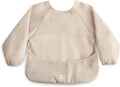 mushie Long Sleeve Baby Bib | Water Resistant Adjustable Fit for Ages 6-24 Months