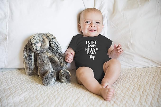 Every Dog Needs a Baby - Funny Baby Essentials Bodysuit - Baby Boy Clothes Newborn Girl Outfits