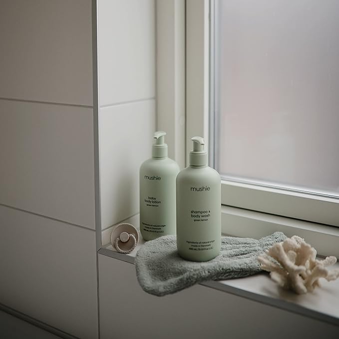 mushie Baby Organic Body Lotion | Moisturize, Soothe, and Hydrates Dry Skin | Made in Denmark, 13.53 fl oz (Green Lemon)