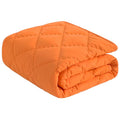 NTBAY Down Alternative Toddler Comforter, Lightweight and Warm Solid Color Baby Crib Quilted Blanket, 39x47 inches, Orange