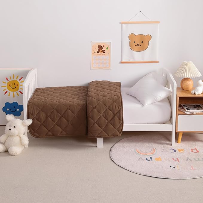 NTBAY Down Alternative Toddler Comforter, Lightweight and Warm Solid Color Baby Crib Quilted Blanket, 39x47 inches, Brown