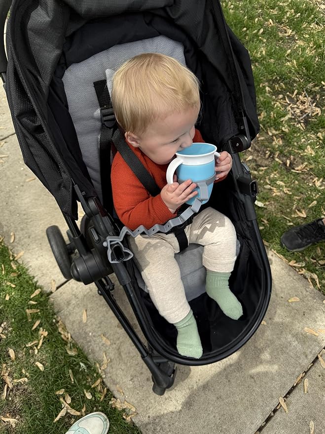 Busy Baby Bottle Bungee - Sippy Cup Strap - Keeps Bottles and Sippy Cups Off The Floor - Food Grade Silicone - Dishwasher Safe (Pink)