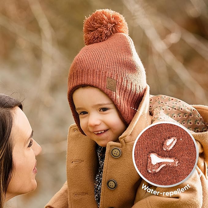 Baby Beanies, Baby Hats for Boys, Girls - Cute Toddler Winter Hat, Soft & Stretchy Beanies for Infant, Newborn 6-36 Months, Cozy & Warm with Earflap Muff & Pom (Regalia)